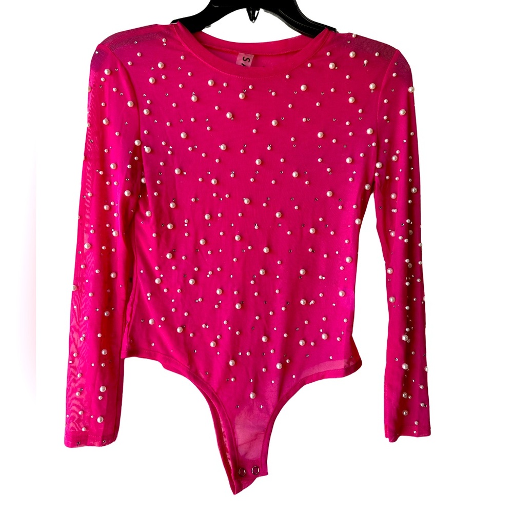 Hot pink bodysuit with pearls and crystals.